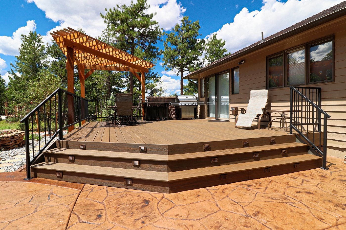 Composite deck with matte-black steel railing